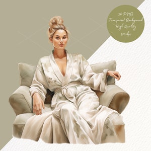 May include: A woman in a white robe with a light brown pattern sits in a beige armchair. The robe has a tie belt and a deep V-neckline. The woman has blonde hair pulled back in a bun.