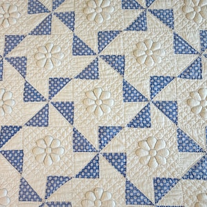 Stunning Vintage Handmade Blue and White Pinwheel Quilt with Rare Trapunto Flowers and Tree of Life Border