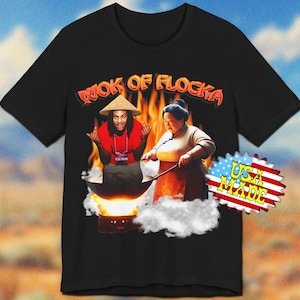 May include: Black t-shirt with a graphic of two people cooking in a wok. The text "Wok of Flocka" is above the image. The text "USA Made" is in a red, white, and blue starburst.