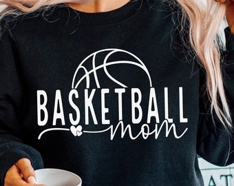May include: Black sweatshirt with a white basketball and the text "Basketball Mom" with a heart.