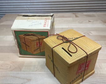 Vintage Santa’s Suprise Package Bank.