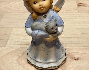 Figurine ange en porcelaine de la collection Goebal « Nina & Marco » de l'artiste Julia E. Limpke