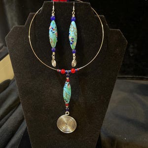 Blue glass lamp work necklace and earrings set