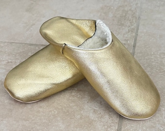 Gold lined slippers.