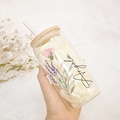 Personalized Birth Flower Tumbler with Name & Bamboo Lid - Glass Coffee Cup (16oz) | Bridesmaid Gift product logo