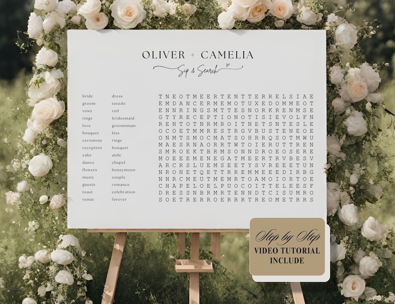 May include: A white wedding sign with a black word search puzzle featuring wedding-related words like "bride", "groom", "rings", "love", "ceremony", "reception", "dance", "flowers", "music", "toast", and "venue". The sign also includes the names "Oliver + Camelia" and the text "Sup & Search".
