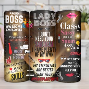 May include: Three stainless steel tumblers with colorful graphics and text. The tumblers feature the phrases "Proud Boss", "Lady Boss", and "Classy, Sassy, and a bit Smart Assy".