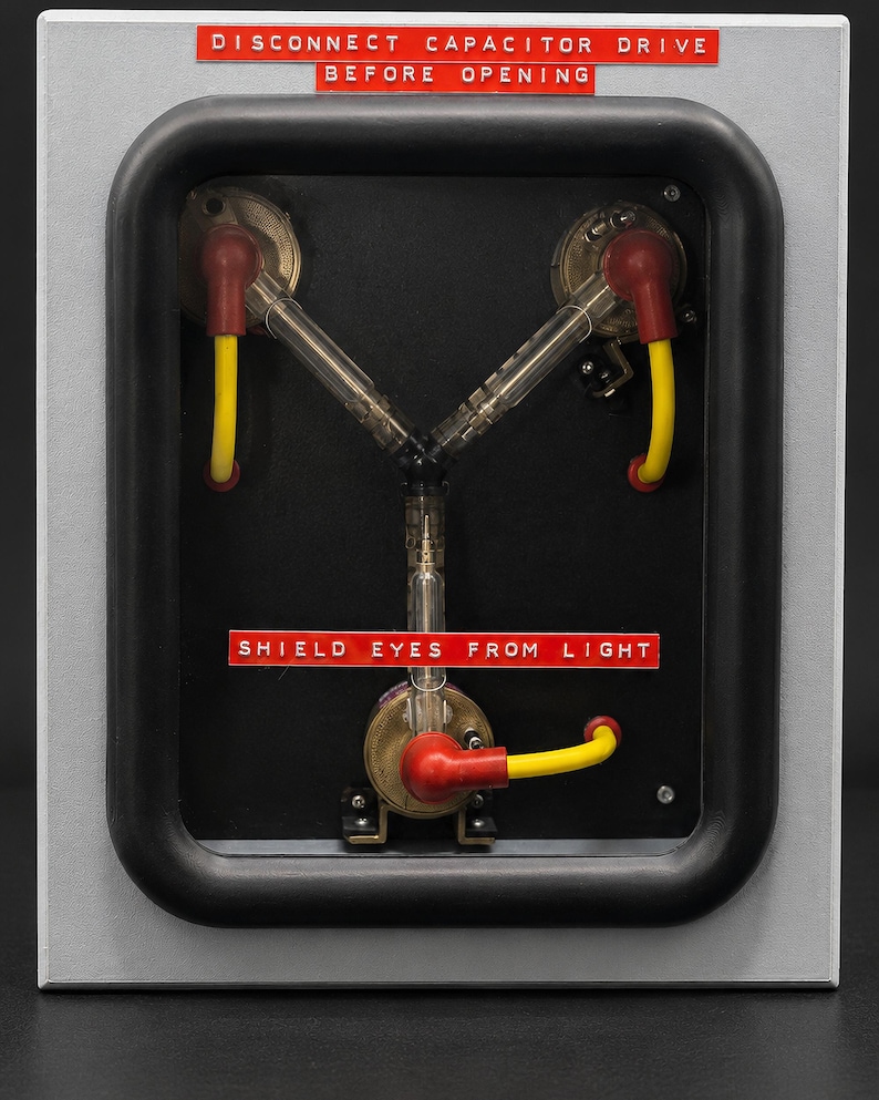 Flux Capacitor switched off showing the DISCONNECT CAPACITOR DRIVE and SHIELD EYES FROM LIGHT warning labels