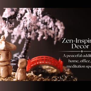 May include: A miniature Zen garden with a small pagoda, a red bridge, and a bonsai tree with pink blossoms. The text "Zen-Inspired Decor" and "A peaceful addition to home, office, or meditation space." is displayed below the garden.