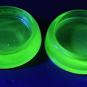 2 Vintage HAZEL ATLAS Green Uranium Glass Furniture Coasters. Do show scratches from use!