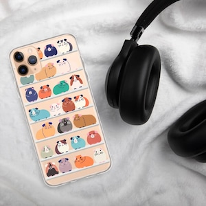 May include: A clear phone case with a colorful pattern of guinea pigs on shelves. The case is designed for an iPhone with a camera bump.