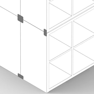 May include: A white modular shelving unit with a geometric design. The shelves are made of wood and are connected by metal brackets. The unit is assembled in a corner and has a modern, minimalist style.
