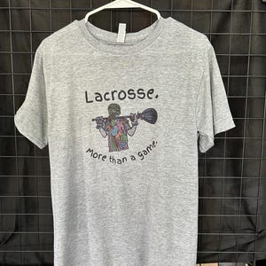 Lacrosse More Than a Game™ Shirt or Hoodie – Hand Drawn Player Design for Kids & Adults