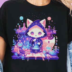 May include: Black t-shirt featuring a cartoon fox in a wizard's cloak, surrounded by potion bottles and books. The fox is depicted with large eyes and a hood, set against a backdrop of purple and blue hues. The word "BLACK" is printed on the bottom left.