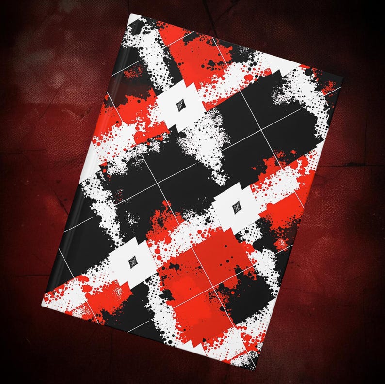 A bold grunge hardcover A5 journal featuring an abstract geometric pattern in striking red, black, and white tones. The design combines sharp shapes, splatter textures, and modern grid elements, creating a powerful streetwear-inspired aesthetic. This matte laminate notebook includes a full wraparound print, 150 lined pages, and durable sewn binding, making it ideal for alternative women, writers, artists, and students who love edgy, modern stationery.