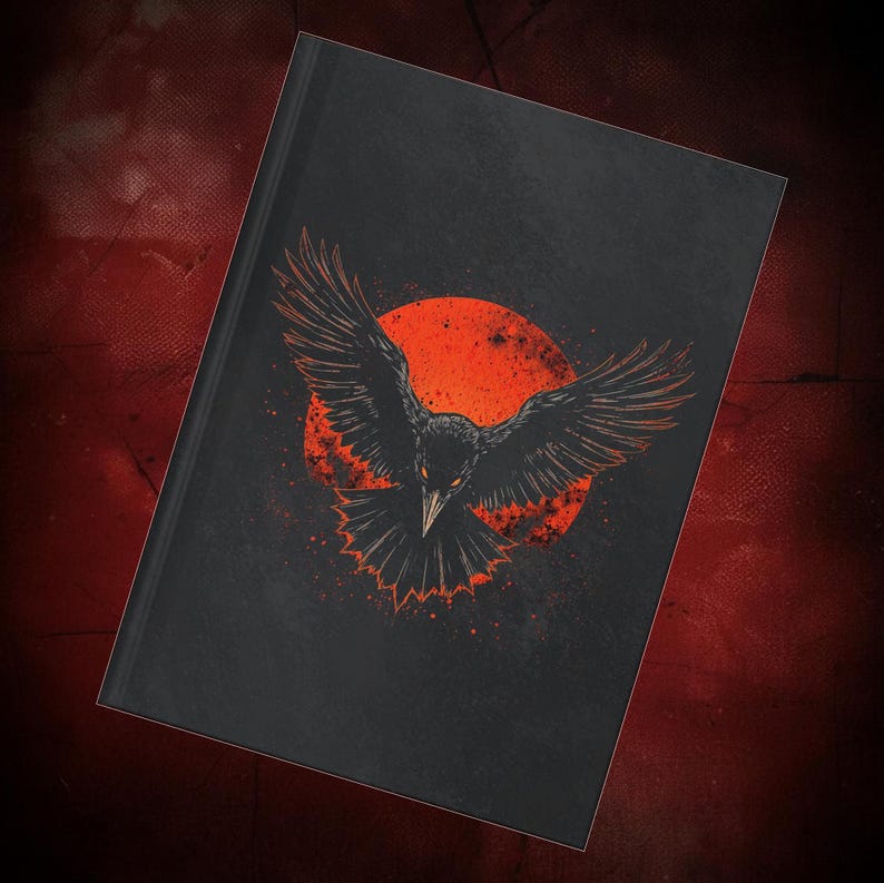 Hardcover gothic journal featuring a dramatic black raven with wings spread wide against a deep red moon on a dark textured background. This A5 notebook has a premium full wraparound print with bold, high-contrast colors and a smooth matte laminate finish. Designed for gothic women, writers, artists, and students who love dark fantasy, witchy aesthetics, and occult symbolism, perfect for journaling, notes, planning, or creative writing.