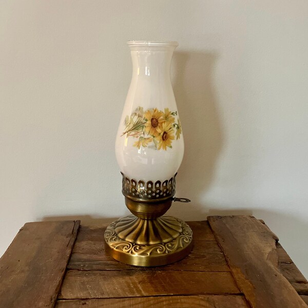 Hurricane lantern lamp, vintage, electric with milk glass shade, yellow gold flowers, bronze metal base and key switch on off.