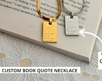 May include: Two gold and silver necklaces with rectangular pendants featuring the quote "To the stars who listen and the dreams that are answered". The necklaces are displayed on a book with the text "YOUR QUOTE HERE" and "CUSTOM BOOK QUOTE NECKLACE" below.