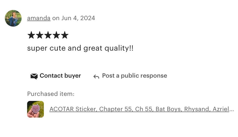 May include: A close-up of a pink and purple heart-shaped sticker with the text "ACOTAR Sticker, Chapter 55, Ch 55, Bat Boys, Rhysand, Azriel..."  The sticker is being held by a hand.