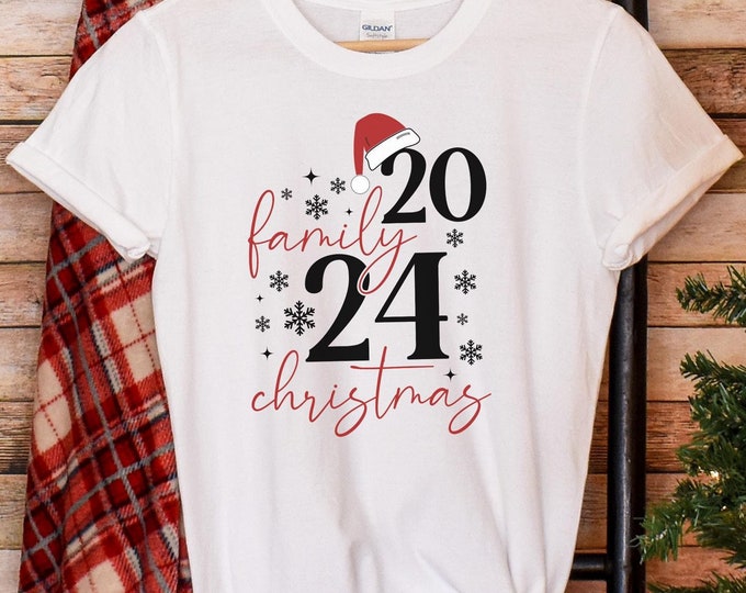 Family Christmas T-Shirt 2024 | Unisex Soft Short Sleeve Tee with Santa Hat | 16 Colors | Lightweight, Ethically Made Holiday Gift