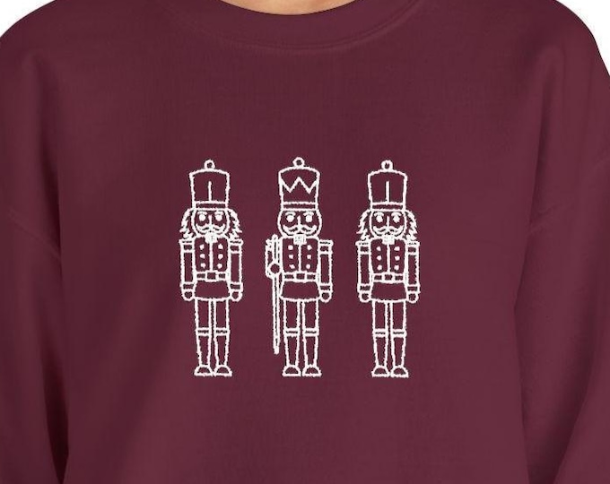 Embroidered Nutcracker Unisex Sweatshirt: Trio Toy Soldiers Christmas Crewneck Cozy Pullover
