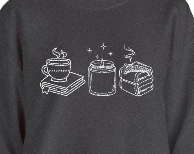 Embroidered Cozy Sweatshirt: Candle Book Blanket Crewneck Fall Pullover