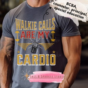 May include: A gray t-shirt with the text "Walkie Calls Are My Cardio" in yellow and red lettering. The text is surrounded by a yellow and gold graphic of a walkie talkie and dumbbells. The text "SASS N SPARKLE STUDIO" is printed in white on a pink starburst.