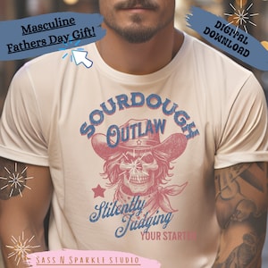 May include: A white t-shirt with a vintage-style graphic design featuring a skull wearing a cowboy hat and the text "Sourdough Outlaw Silently Judging Your Starter".