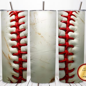 May include: A set of three stainless steel tumblers with a baseball design. The tumblers feature a white background with red stitching, mimicking the look of a baseball. Each tumbler has a silver straw and lid.