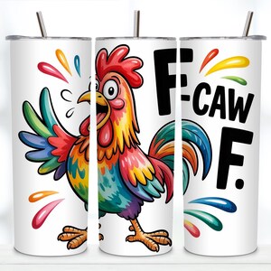 May include: A white cylindrical tumbler with a metal straw featuring a colourful cartoon rooster with wide eyes and an open beak. The design includes multi-coloured paint splatters and the bold black text F-CAW F. printed on the side of the cup.