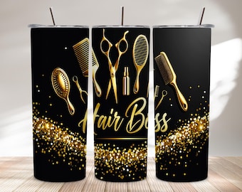 May include: Black tumbler with gold hair styling tools and the words "Hair Boss". The design includes combs, scissors, and a bottle, with gold glitter accents. A silver straw is in the lid.