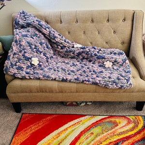Wrap yourself in pure softness with this handmade chunky knit chenille throw. This extra-large 60” x 75” blanket is plush, cozy, and perfect