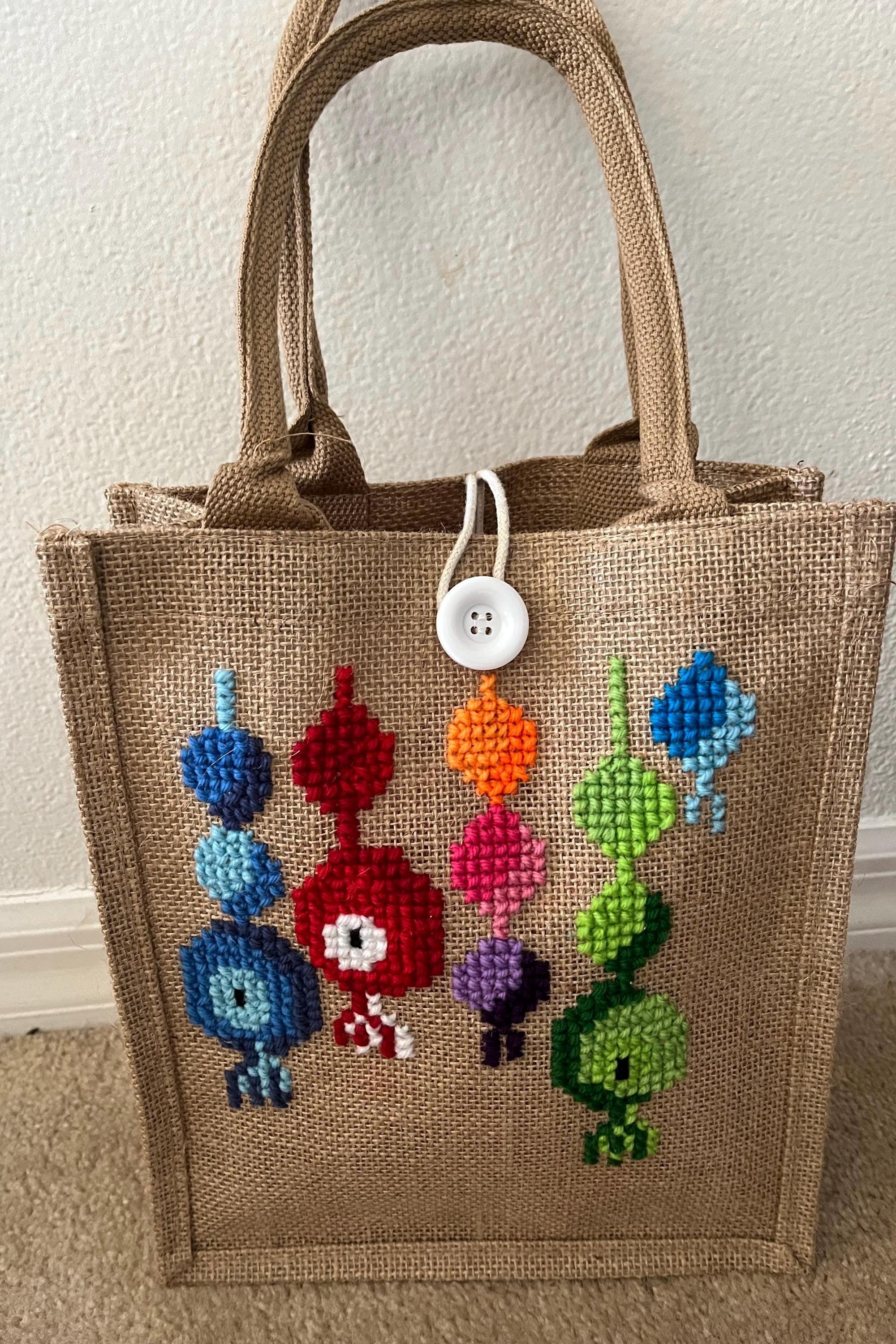 手刺繍のジュートトートバッグ：カラフルなクロスステッチデザイン 