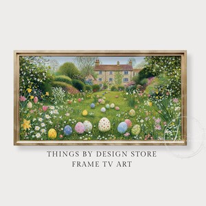 May include: A framed digital art print featuring a pastoral scene with a house, garden, and Easter eggs scattered on the lawn. The artwork is set in a wooden frame and includes the text "THINGS BY DESIGN STORE FRAME TV ART".