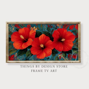 May include: A framed artwork featuring three vibrant red hibiscus flowers with yellow stamens against a teal background with green leaves and other floral elements. The artwork is labeled "THINGS BY DESIGN STORE FRAME TV ART".