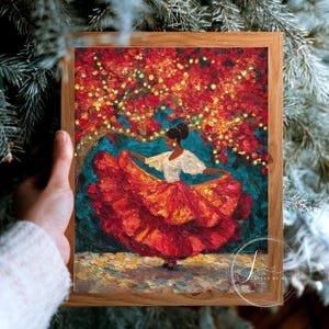May include: A framed painting depicts a woman in a flowing red and orange dress dancing under a tree with red leaves and golden lights. The artwork has a textured, impressionistic style, with a teal background.