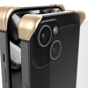 May include: A black smartphone case with a gold accent around the camera lens. The case has a clear screen protector.