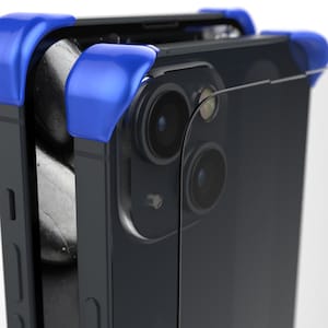 May include: A black smartphone with a blue protective case and a clear screen protector. The case has a raised lip around the camera lenses.