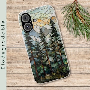 May include: A phone case with a stained glass design of a mountain scene with trees. The design is in shades of blue, green, and brown.