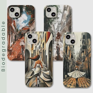 May include: Biodegradable phone cases featuring artistic illustrations of a person riding a bicycle down a city street. The cases showcase a woman in a white dress, with long flowing hair, cycling through various European-style cityscapes.