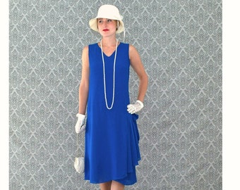 Sapphire blue 1920s Great Gatsby day dress with drape and bow on the skirt, blue flapper dress, Roaring 20s fashion, Downton Abbey day dress Sapphire blue 1920s Great Gatsby day dress with drape and bow on the skirt, blue flapper dress, Roaring 20s fashion, Downton Abbey day dress
