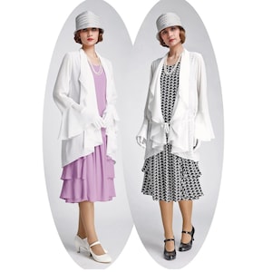May include: Two women wearing white ruffled jackets with long sleeves and a white hat. One woman is wearing a purple tiered skirt and the other is wearing a black and white patterned tiered skirt. Both women are wearing white gloves and black shoes.