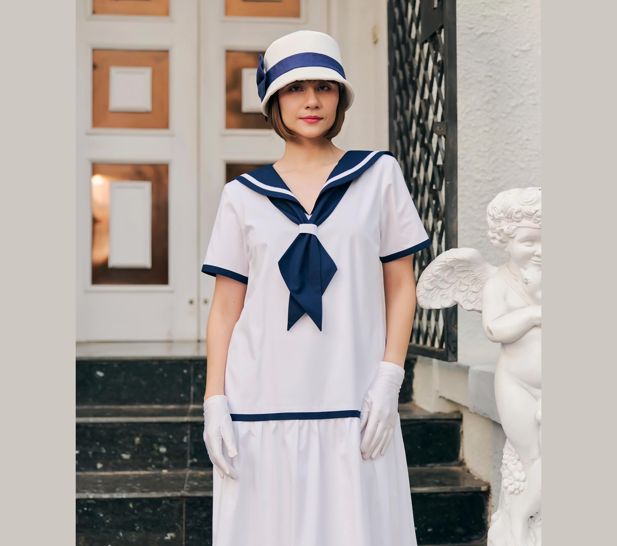 sailor dress for woman Miss Circle Calliope Pleated Mini - Navy This sleeveless design is crafted in a solid navy blue color and hits just about the knee Sailor Dress – Lazy Oaf