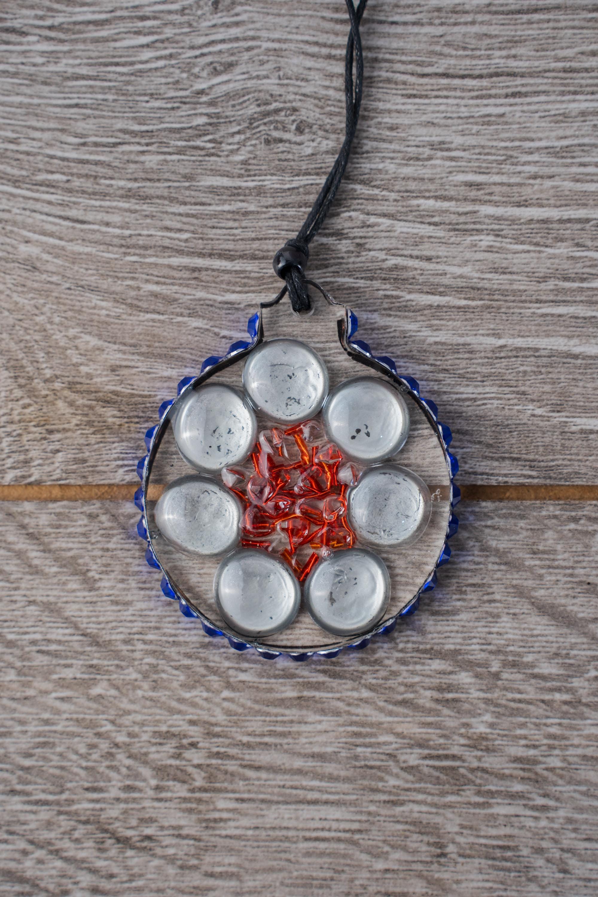 Seven Moons - Resin ornament with a design featuring silver backed pebbles, bugle beads and a rhinestone halo - Thumbnail 2