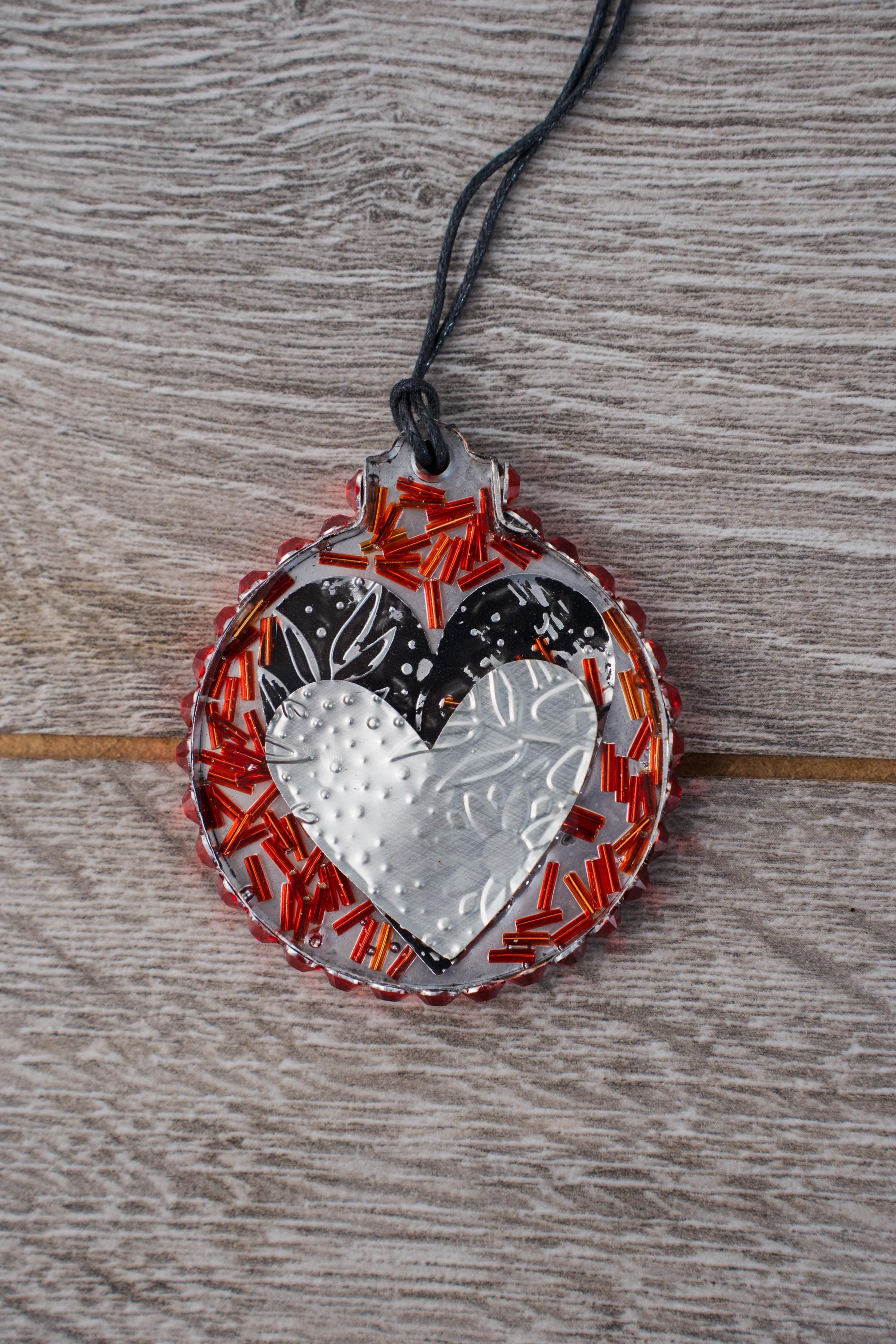 Heart Sisters - Resin ornament featuring handcut embossed hearts from recycled aluminum and a rhinestone halo - Thumbnail 2