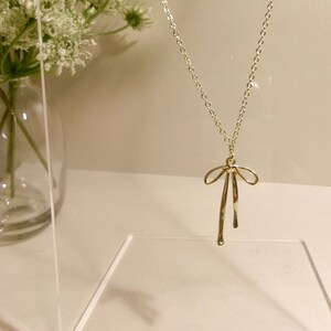 trendy, cute, dainty bow charm necklace