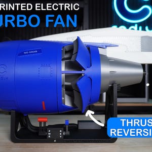 May include: A 3D printed electric turbo fan model in blue and silver with thrust reversing features. The unit includes a black base with power and reverse switches, and text reading 3D PRINTED ELECTRIC TURBO FAN and NO GRAB on the casing.