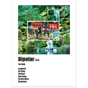 May include: A digital album cover for the album "Bipolar" by Yot Club. The cover features a vibrant image of a waterfall cascading down a mossy rock face, with a cityscape in the background. The album title and artist name are displayed in bold white text below the image.