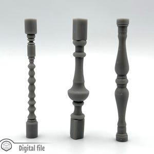 May include: Three different styles of gray balusters, each with a unique design. The balusters are made of a smooth, solid material and are perfect for adding a touch of elegance to any home.
