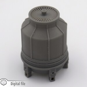 May include: A grey plastic model of a cooling tower with a fan on top. The tower is cylindrical in shape with a series of horizontal ribs around the middle. The fan is made of a series of blades arranged in a circle.